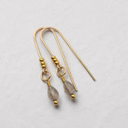 Bijou by SAM teardrop threader earrings featuring translucent ice obsidian gemstones on 14k gold fill wire.