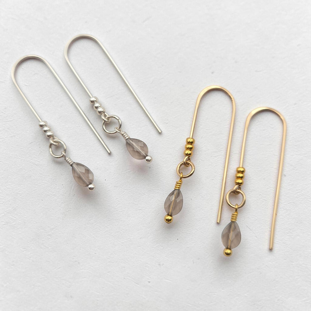 Bijou by SAM handcrafted teardrop Ice Obsidian threader earrings in sterling silver and 14k gold fill on white.