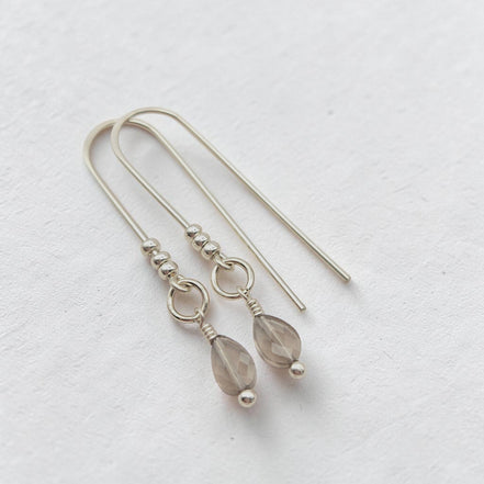 Bijou by SAM handcrafted sterling silver threader earrings featuring faceted teardrop Ice Obsidian gemstones.