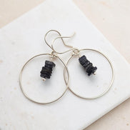 Bijou by SAM handmade hoop earrings featuring a delicate stack of square-cut deep blue iolite gemstones in silver.