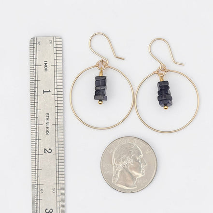 Bijou by SAM handmade gold hoop earrings featuring a delicate stack of square-cut deep blue iolite gemstones.