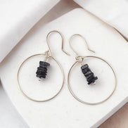 Bijou by SAM handmade sterling silver hoop earrings featuring a delicate stack of deep blue square-cut iolite gemstones.