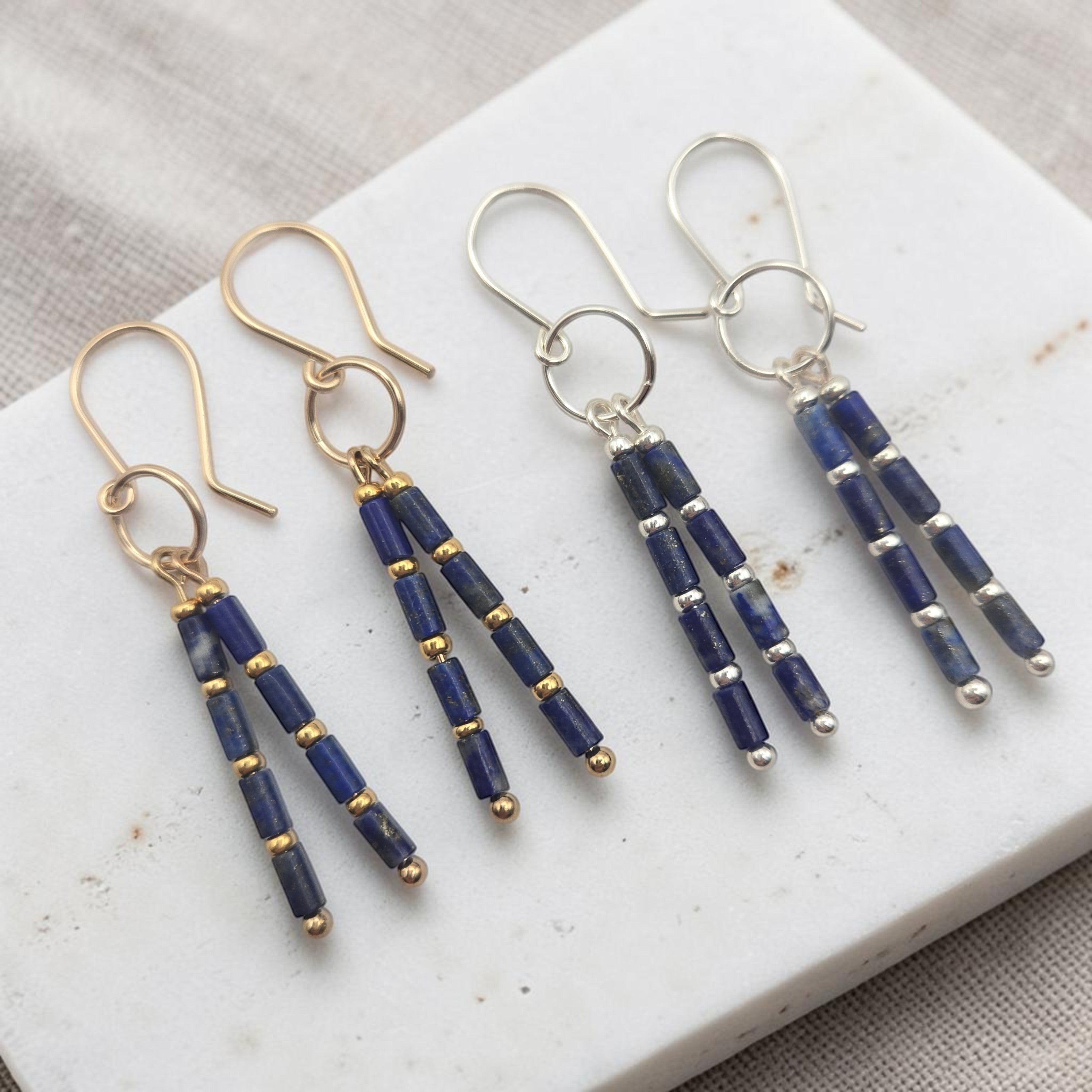 Bijou by SAM Midnight Sky earrings featuring natural Lapis Lazuli tube beads with gold and silver metal accents.