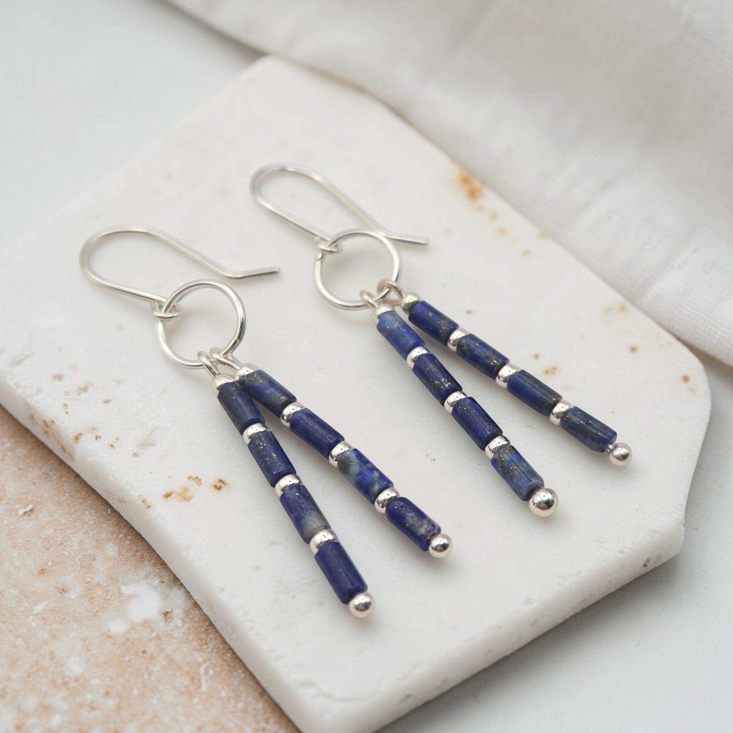 Bijou by SAM Midnight Sky earrings featuring natural blue Lapis Lazuli tube beads and sterling silver dangles.