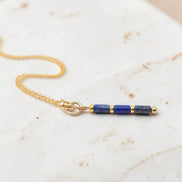 Bijou by SAM Midnight Sky necklace featuring natural blue Lapis Lazuli tube beads on a 14k gold fill chain.