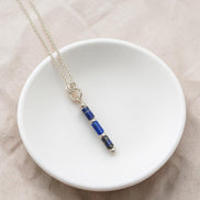 Bijou by SAM Midnight Sky necklace featuring deep blue Lapis Lazuli tube beads on a delicate sterling silver chain.