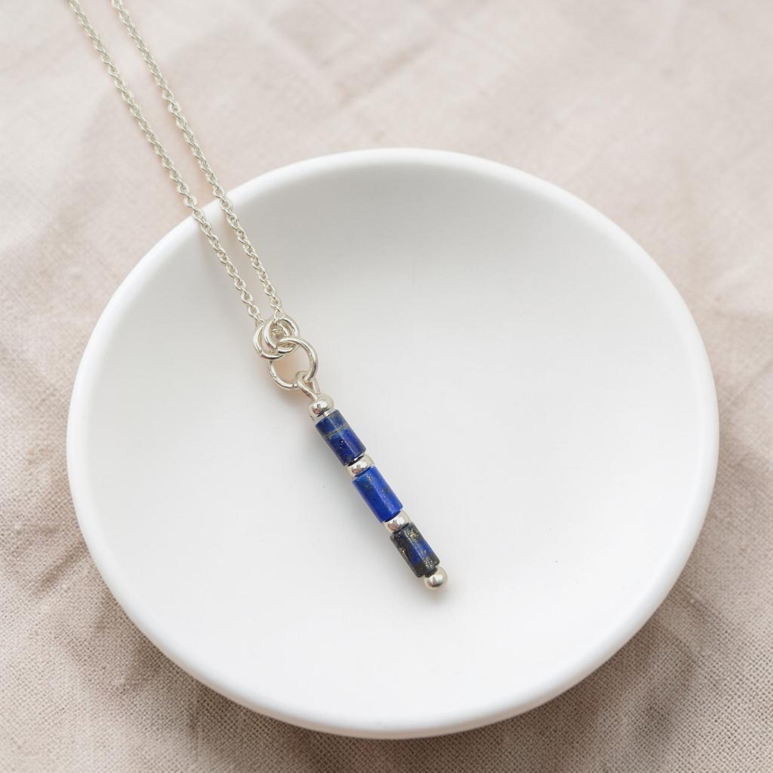 Bijou by SAM Midnight Sky necklace featuring deep blue Lapis Lazuli tube beads on a delicate sterling silver chain.
