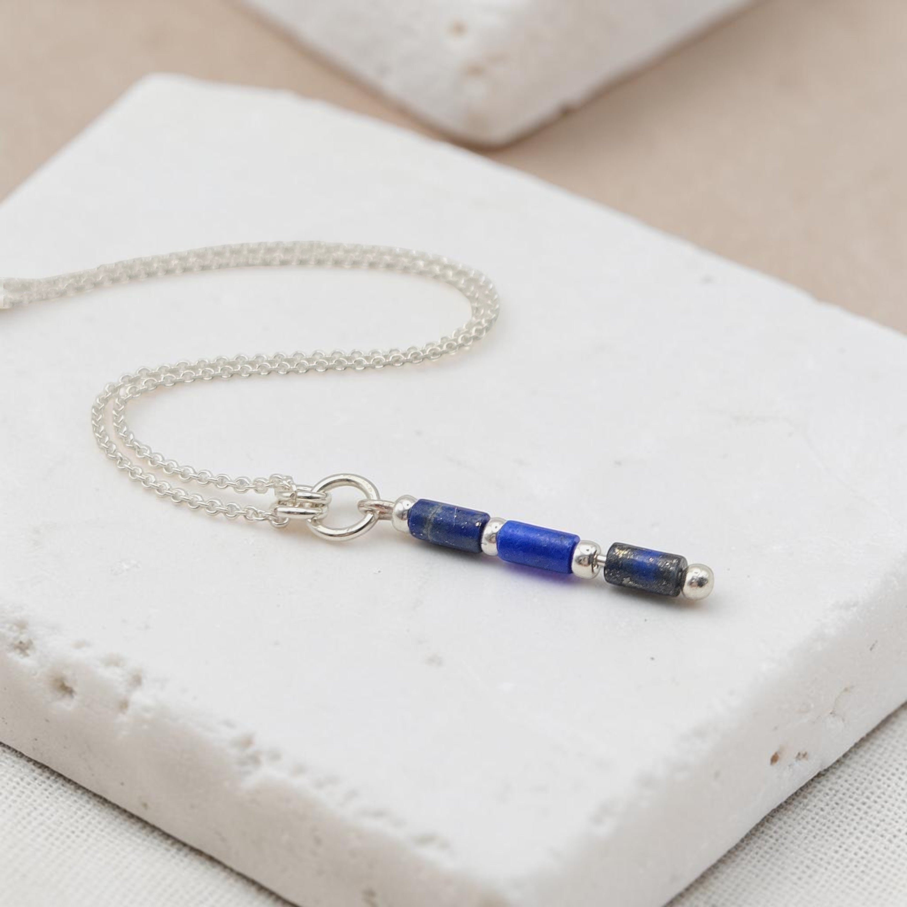 Bijou by SAM Midnight Sky necklace featuring natural lapis lazuli tube beads on a delicate sterling silver chain.