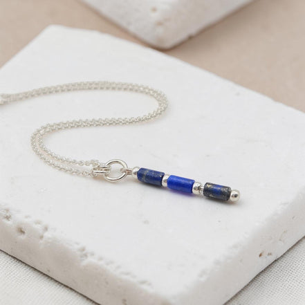 Bijou by SAM Midnight Sky necklace featuring natural lapis lazuli tube beads on a delicate sterling silver chain.