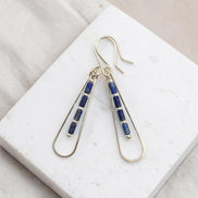 Bijou by SAM Midnight Sky teardrop earrings featuring natural blue Lapis Lazuli tube beads on silver hoops.