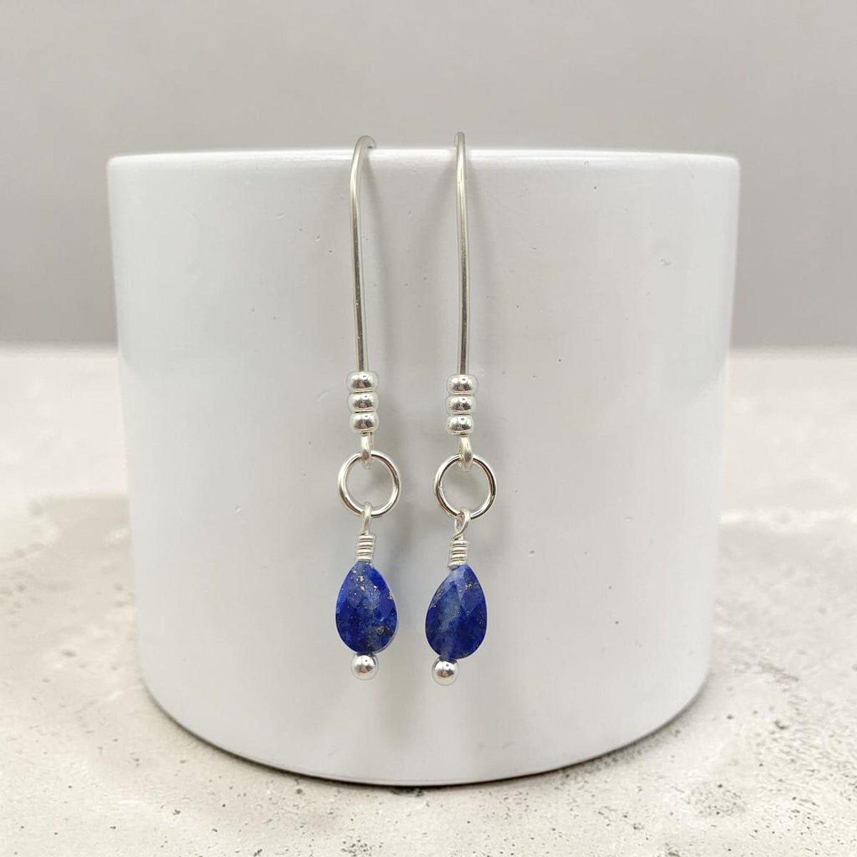 Bijou by SAM handcrafted sterling silver threader earrings featuring teardrop-shaped genuine Lapis Lazuli gemstones.