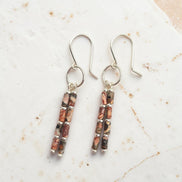 Bijou by SAM Wild Mesa dangle earrings featuring natural Leopard Skin Jasper tube beads on handmade sterling silver hoops.