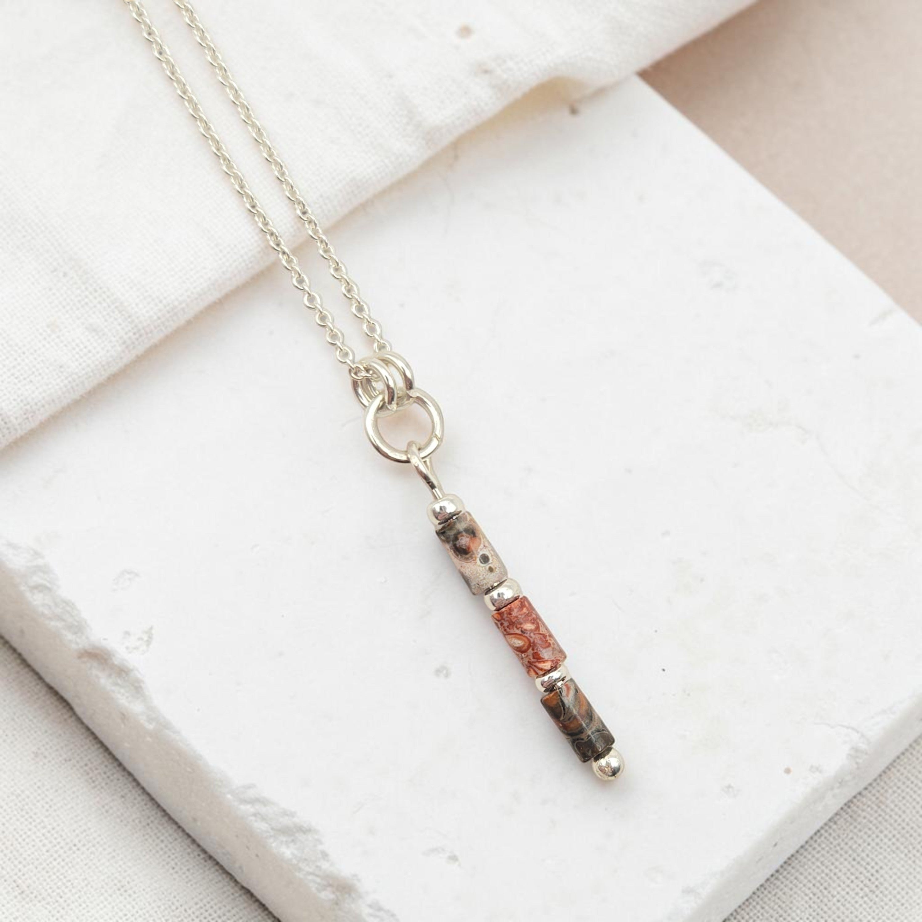 Bijou by SAM Wild Mesa necklace featuring natural Leopard Skin Jasper tube beads on a sterling silver chain.
