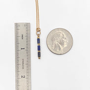 Bijou by SAM Midnight Sky Necklace featuring natural blue Lapis Lazuli tube beads on a 14k gold fill chain with scale