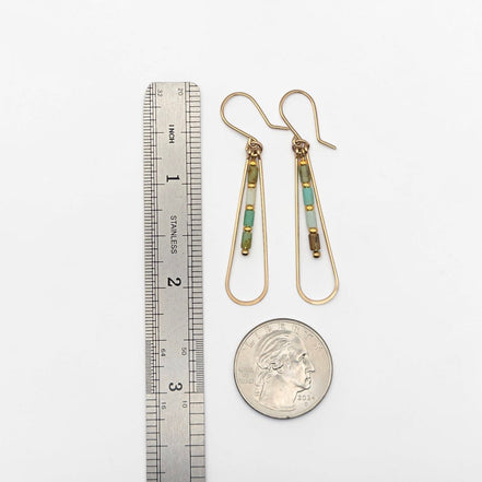 Bijou by SAM Morning Dew teardrop hoop earrings with green Chrysoprase beads and 14k gold fill wire on white background
