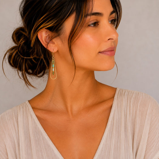 Bijou by SAM Morning Dew teardrop hoop earrings with green Chrysoprase beads worn by a woman in a neutral top.
