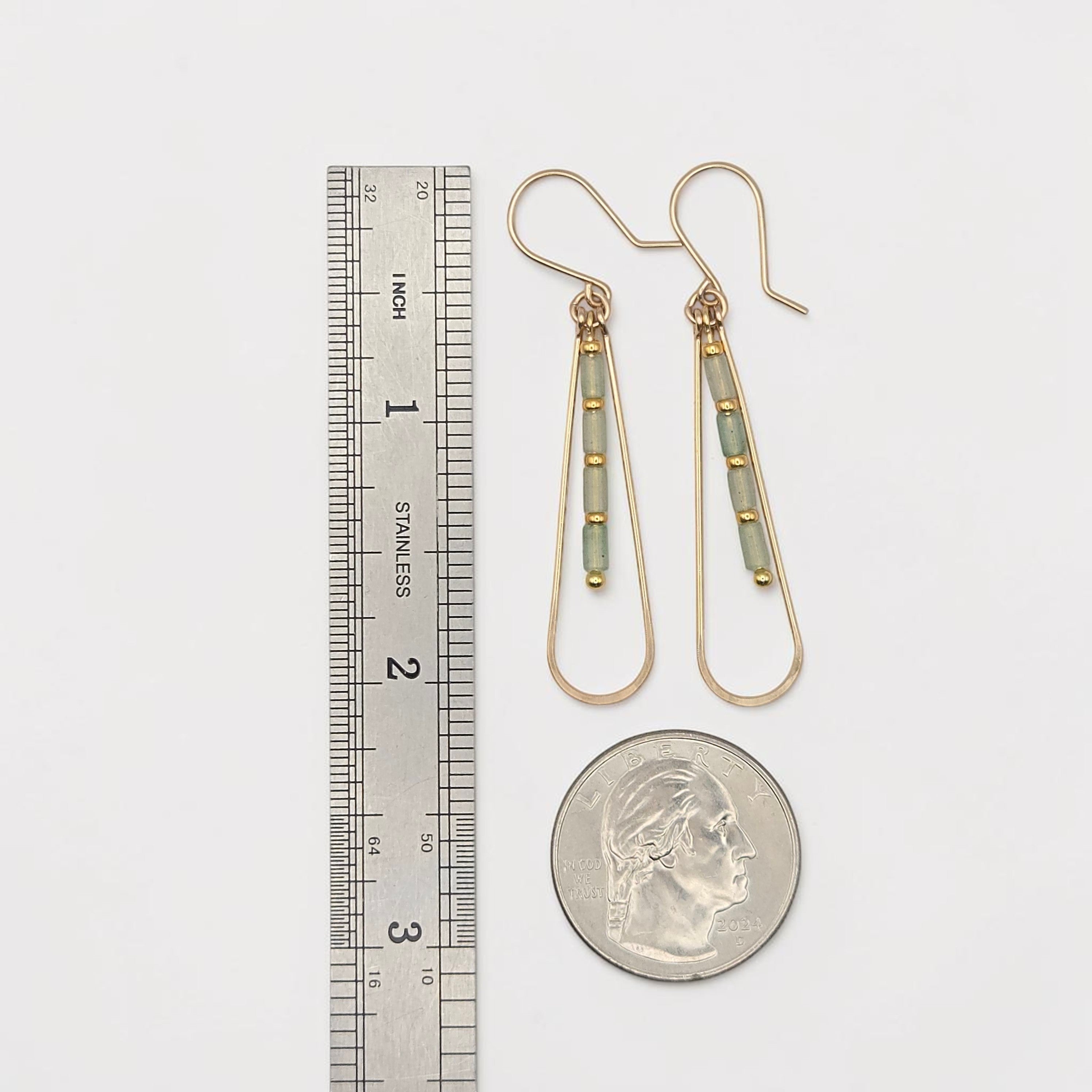 Bijou by SAM Mossy Creek teardrop earrings featuring green aventurine beads and 14k gold fill hoops next to a ruler.