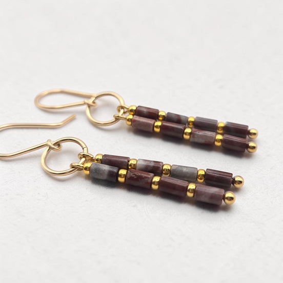 Bijou by SAM Painted Bluff dangle earrings featuring natural red rainbow jasper tube beads and 14k gold fill accents.