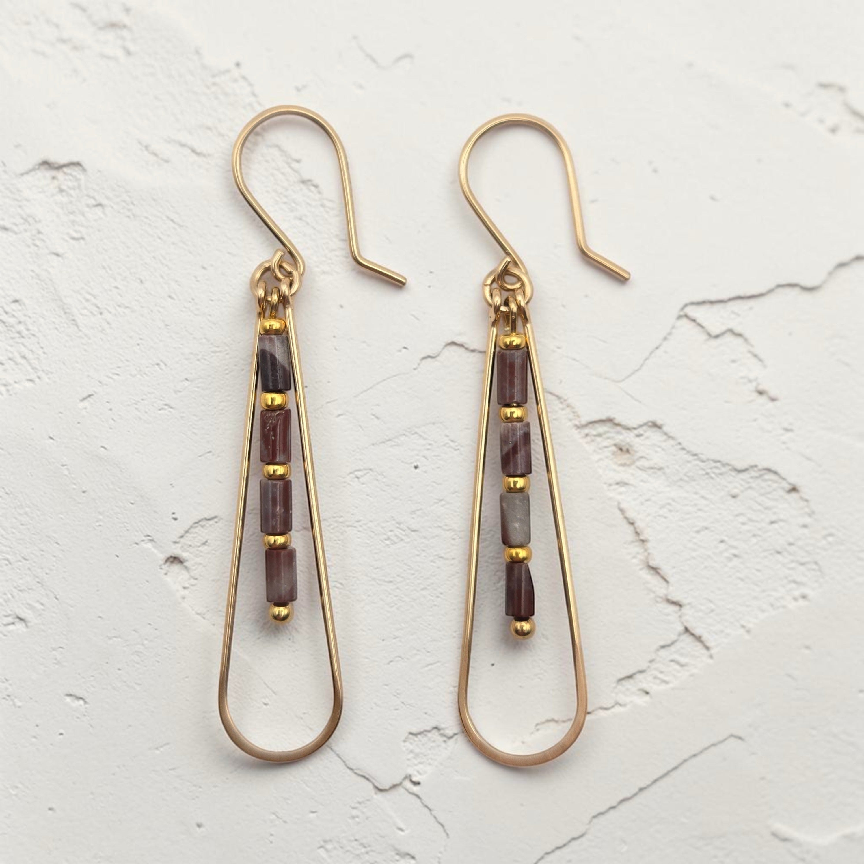 Bijou by SAM Painted Bluff teardrop hoop earrings featuring maroon and gray Red Rainbow Jasper beads in 14k gold fill.