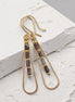 Bijou by SAM Painted Bluff teardrop hoop earrings with maroon and gray Red Rainbow Jasper beads in 14k gold fill.