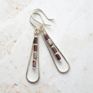 Bijou by SAM Painted Bluff teardrop hoop earrings featuring maroon and gray Red Rainbow Jasper tube beads in silver.