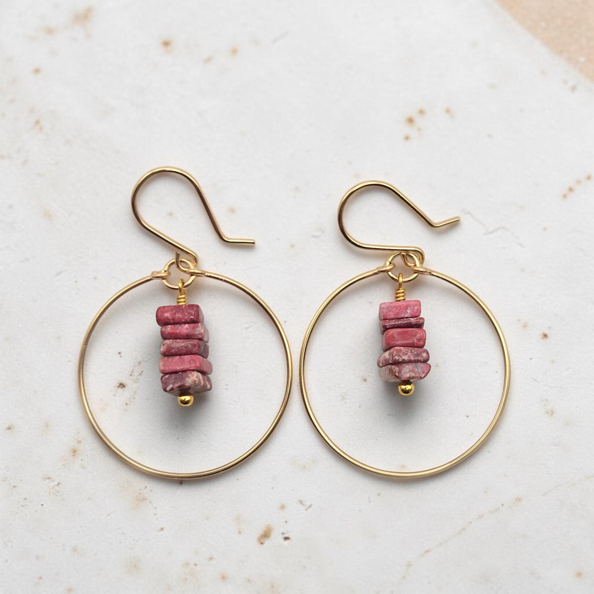Bijou by SAM handmade gold hoop earrings featuring a delicate stack of square-cut pink Thulite gemstones
