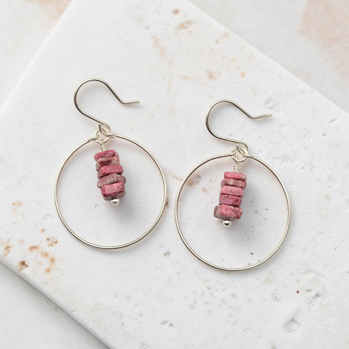 Bijou by SAM handmade hoop earrings featuring square-cut pink Thulite gemstone stacks on silver wire