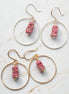 Bijou by SAM handmade hoop earrings featuring square-cut pink Thulite stones on gold and silver wire
