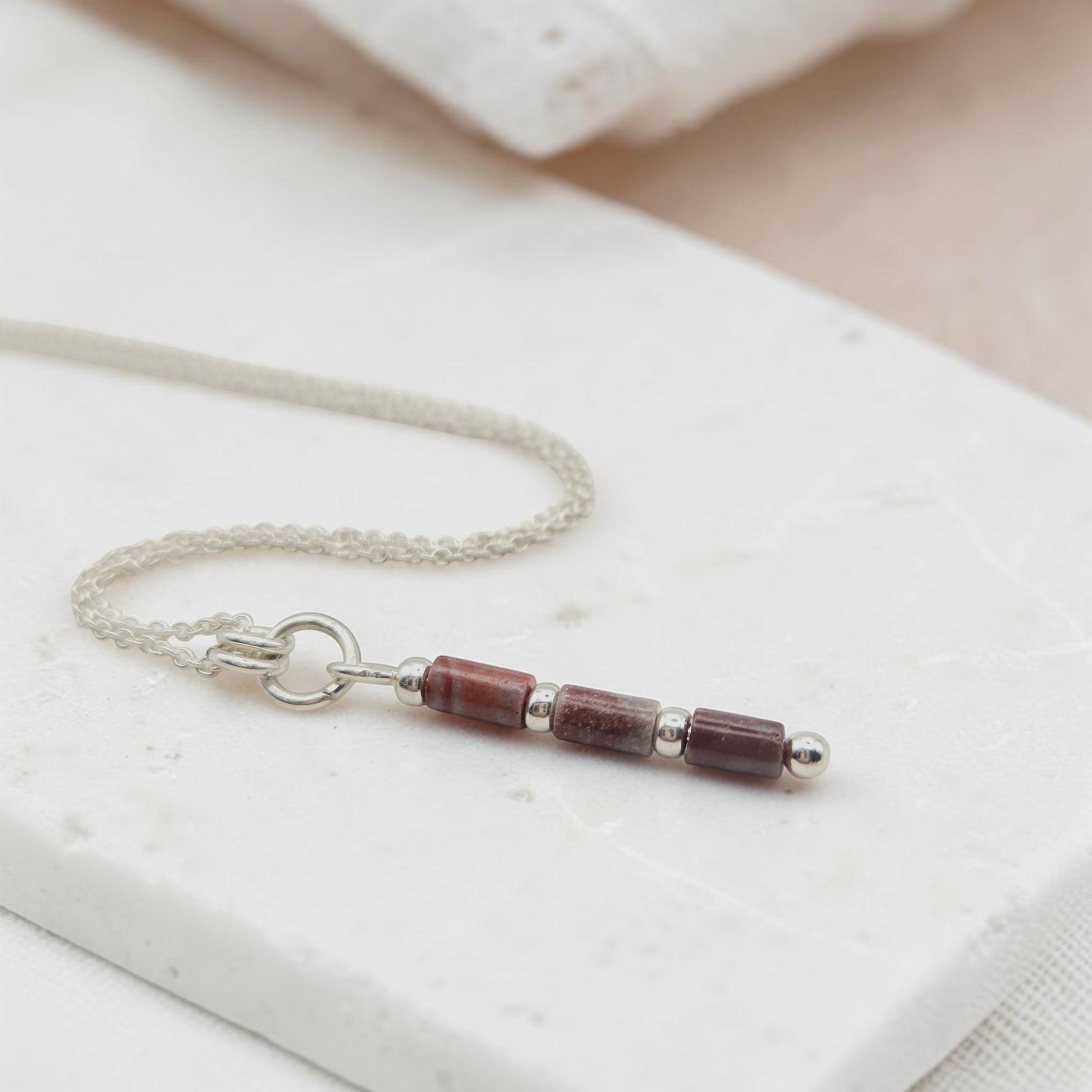 Bijou by SAM Painted Bluff necklace with natural red rainbow jasper tube beads and sterling silver chain.