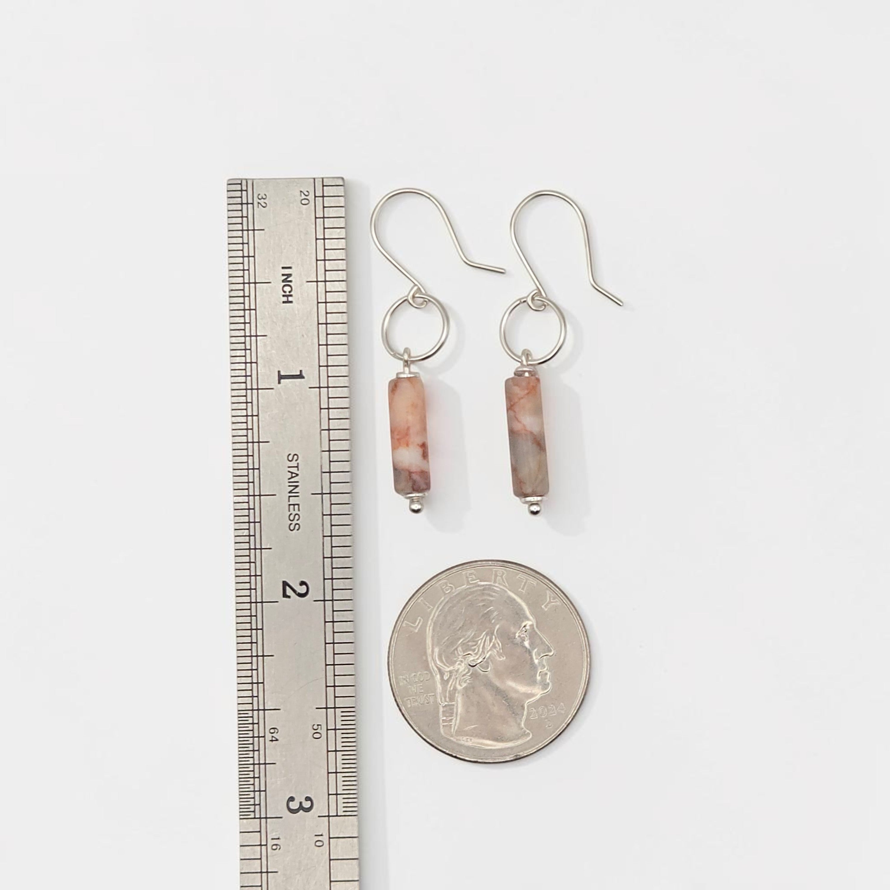 Bijou by SAM Olivia earrings featuring cylindrical Redline Jasper stones on sterling silver hoops with a scale ruler.