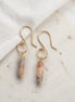 Bijou by SAM Olivia earrings featuring cylindrical Redline Jasper stones on 14k gold fill hoops.