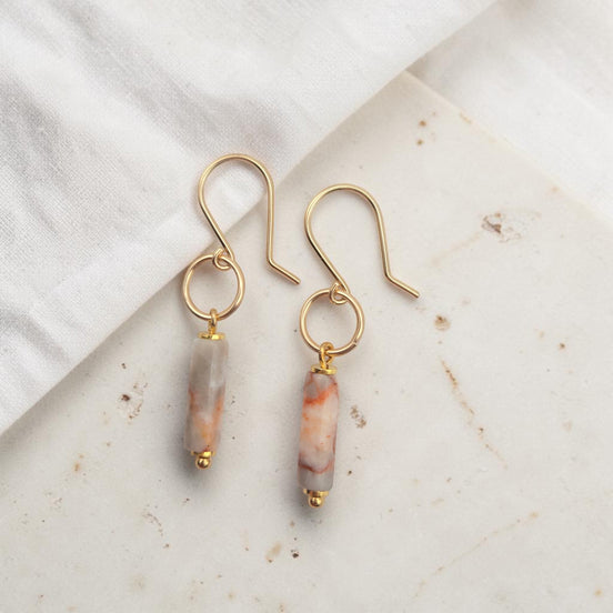 Bijou by SAM Olivia earrings featuring cylindrical Redline Jasper stones on 14k gold fill hoops.