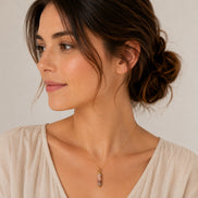 Bijou by SAM Olivia necklace featuring a natural Redline Jasper cylinder pendant on a delicate gold chain