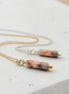 Bijou by SAM Olivia necklace featuring a cylindrical Redline Jasper bead on delicate gold fill and sterling silver chains