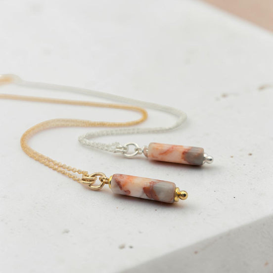 Bijou by SAM Olivia necklace featuring a cylindrical Redline Jasper bead on delicate gold fill and sterling silver chains