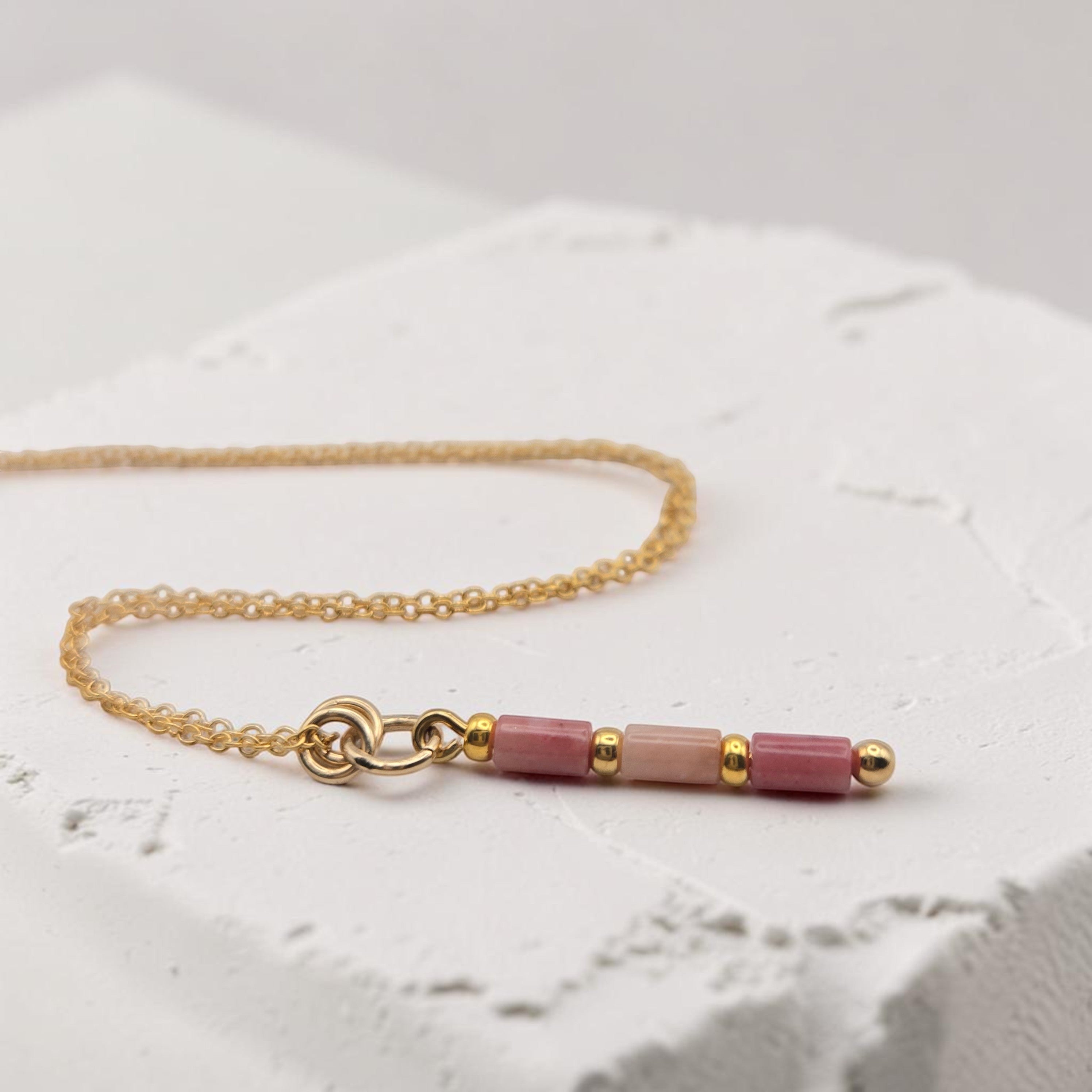 Bijou by SAM Rose Bluff necklace featuring natural pink rhodonite tube beads on a delicate 14k gold fill chain.