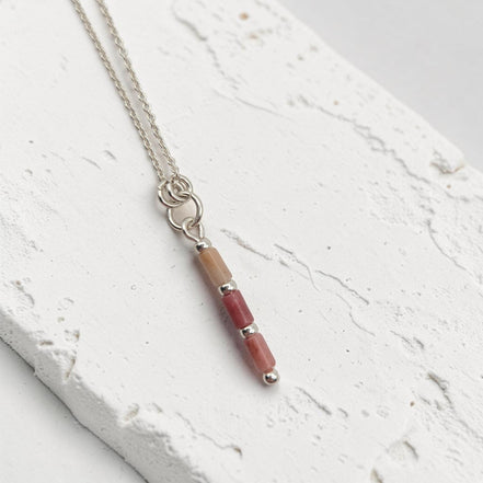 Bijou by SAM Rose Bluff necklace featuring natural pink rhodonite tube beads on a delicate sterling silver chain.