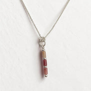 Bijou by SAM Rose Bluff necklace featuring natural pink rhodonite tube beads on a delicate sterling silver chain.