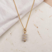 Bijou by SAM Aurora necklace featuring three soft blush rose quartz beads on a delicate 14k gold fill chain.