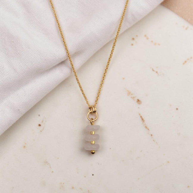 Bijou by SAM Aurora necklace featuring three soft blush rose quartz beads on a delicate 14k gold fill chain.