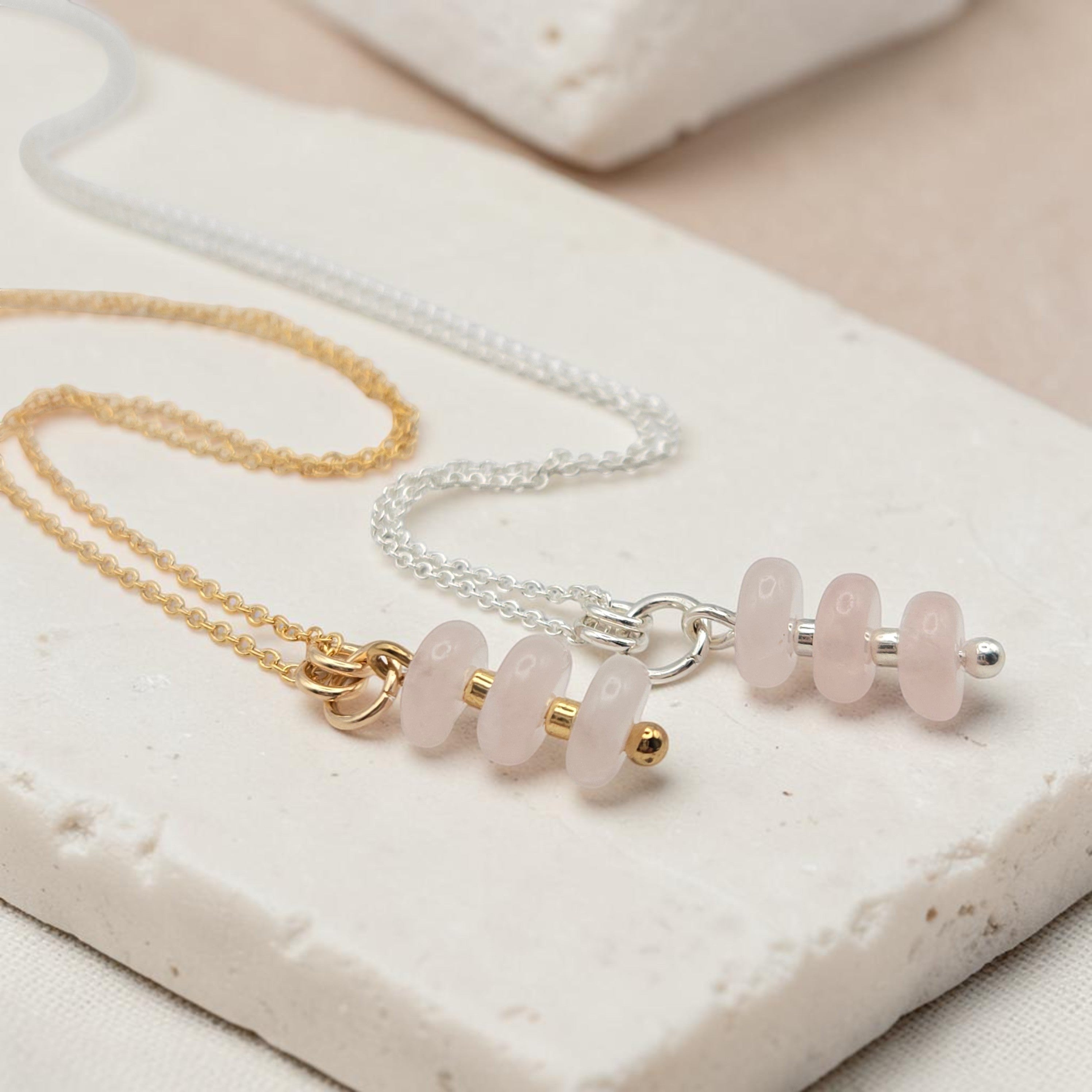 Bijou by SAM Aurora necklaces featuring soft blush rose quartz beads on delicate gold fill and sterling silver chains.