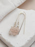 Bijou by SAM Aurora threader earrings featuring blush pink rose quartz beads on handcrafted sterling silver wire.