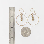 Bijou by SAM handmade gold hoop earrings featuring a delicate stack of pale yellow and tan rutilated quartz stones.