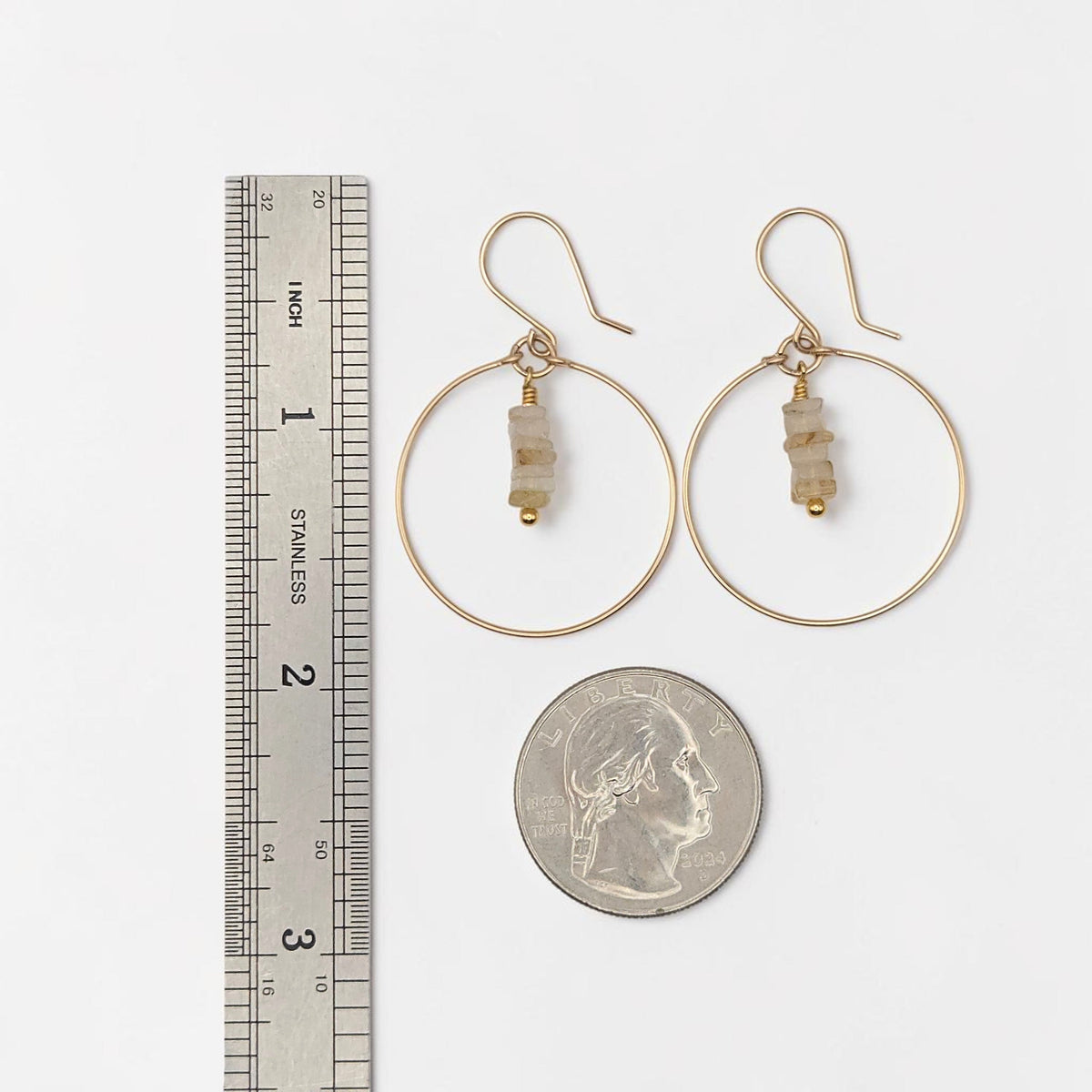 Bijou by SAM handmade gold hoop earrings featuring a delicate stack of pale yellow and tan rutilated quartz stones.