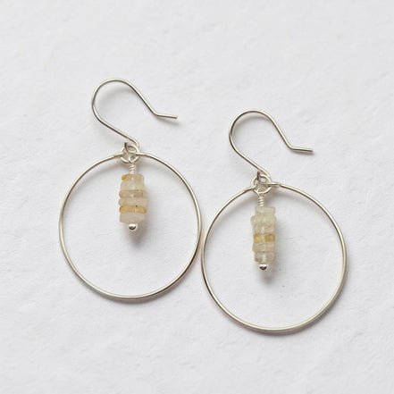 Bijou by SAM handmade sterling silver hoop earrings featuring a delicate stack of pale yellow rutilated quartz stones.