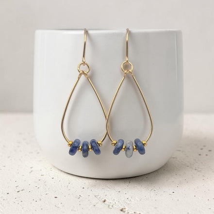 Bijou by SAM Milky Way teardrop hoop earrings featuring deep blue sodalite beads on 14k gold fill wire.