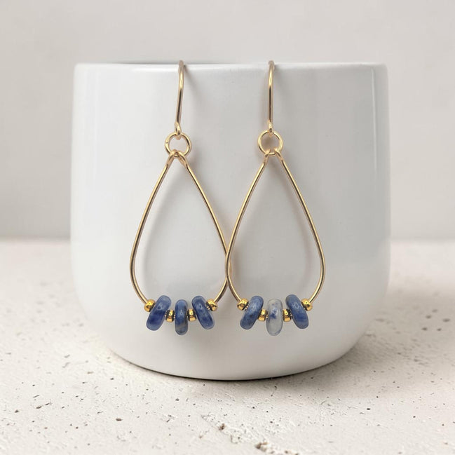 Bijou by SAM Milky Way teardrop hoop earrings featuring deep blue sodalite beads on 14k gold fill wire.