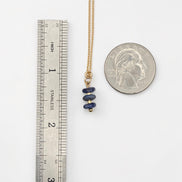 Bijou by SAM Milky Way necklace featuring three blue sodalite gemstone beads on a delicate gold chain with scale