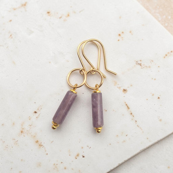 Bijou by SAM Sophia earrings featuring purple amethyst cylinder gemstones on handcrafted 14k gold fill hoops