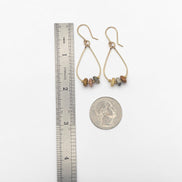Bijou by SAM Stardust teardrop hoop earrings featuring crazy lace agate stones on 14k gold fill wire with ruler scale.